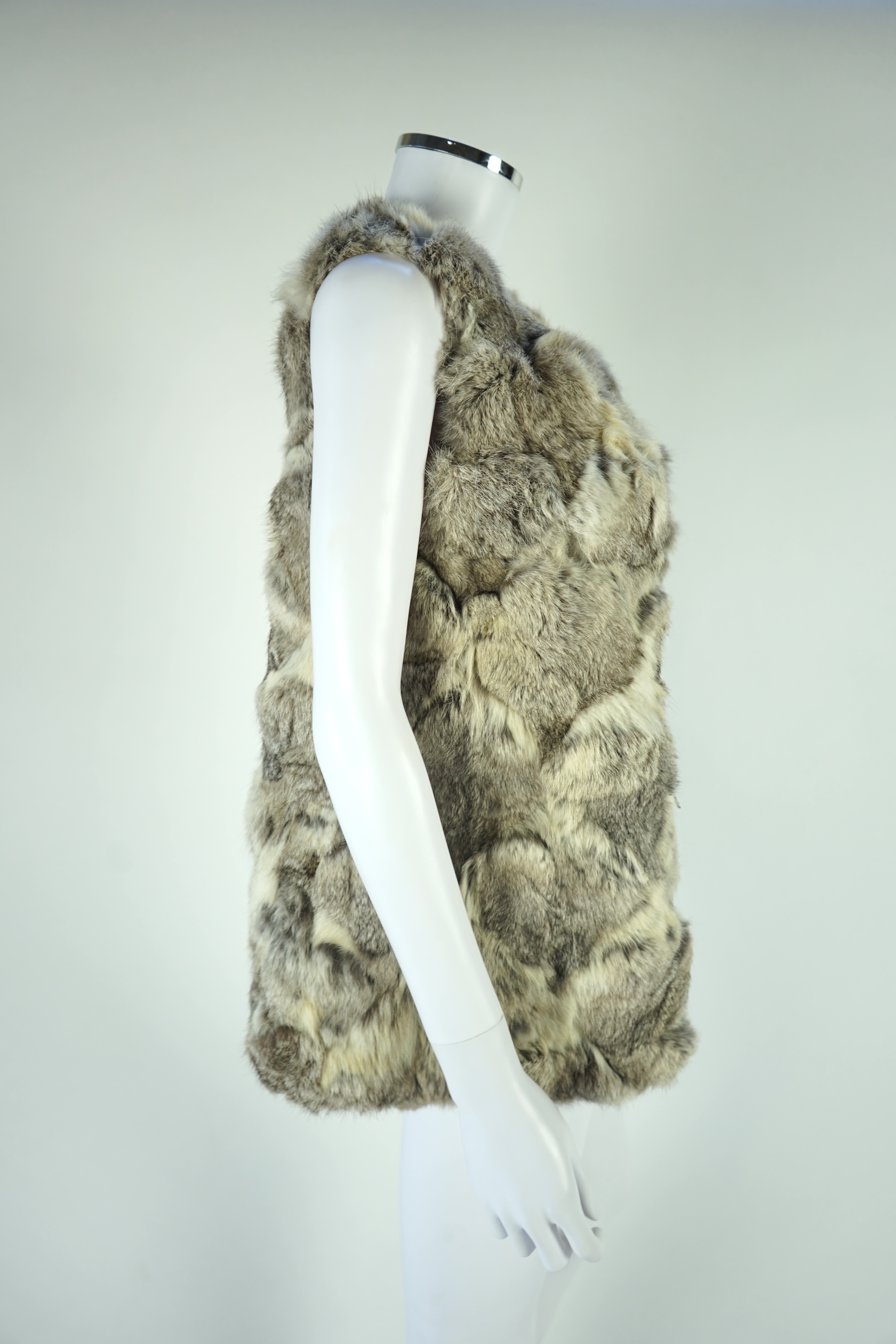 A selection of fur scarves and a fur gilet